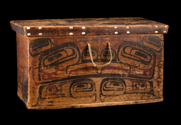 Lot 27 UNIDENTIFIED ARTIST, PROBABLY HAIDA Chief's Chest, c. 1870 wood, paint, leather, and opercula shells, 18.5 x 32.75 x 18.5 in (47 x 83.2 x 47 cm) ESTIMATE: $40,000 — $60,000 PRICE REALIZED: $38,500.00