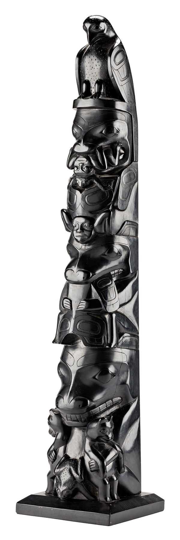 Lot 22 JIM MACKAY (DOWEKYE-KYIHLAS) (c. 1890 - c. 1945), HAIDA, SKIDEGATE / PRINCE RUPERT Model Totem Pole, c. 1930 argillite, 20 x 4.5 x 4 in (50.8 x 11.4 x 10.2 cm) ESTIMATE: $18,000 — $28,000 PRICE REALIZED: $16,800.00