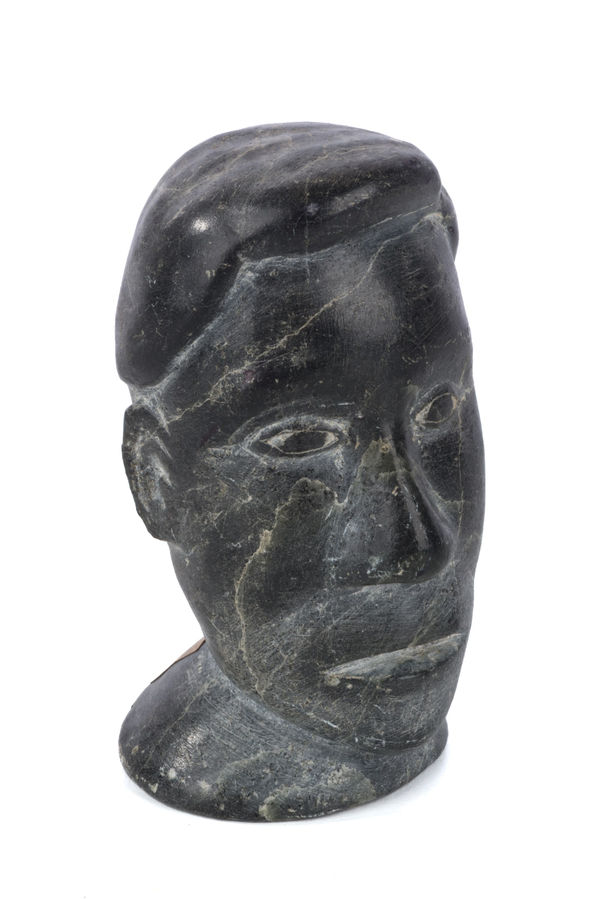 Lot 38 MATIUSI MANUKULLU QILUQI (1911-1968) PUVIRNITUQ (POVUNGNITUK) Head of a Man, c. mid 1960s stone, 4.75 x 2.5 x 2.5 in (12.1 x 6.3 x 6.3 cm) ESTIMATE: $250 — $350 PRICE REALIZED: $73.20