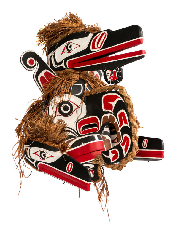 Lot 9 STAN WAMISS (1947-) DZAWADA'ENUXW (TSAWATAINEUK) / KWAKWA̱KA̱ʼWAKW, KINGCOME INLET, B.C. Crooked Beak of Heaven (Four-Faced Hamat'sa Mask), early 2000s carved cedar, cedar bark, and acrylic paint, 24 x 22.25 x 24.5 in (61 x 56.5 x 62.2 cm) ESTIMATE: $3,000 — $5,000 PRICE REALIZED: $8,540.00