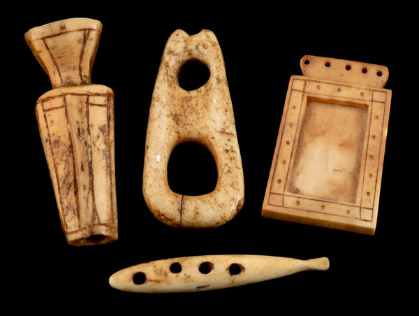 Lot 117 HISTORIC PERIOD INUIT OR POSSIBLY THULE CULTURE MAKERS Implements and Amulets,, c. 19th century or earlier ivory, bone, and pigment, largest: 2 x 0.75 x 0.5 in (5.1 x 1.9 x 1.3 cm) ESTIMATE: $400 — $600 PRICE REALIZED: $390.00