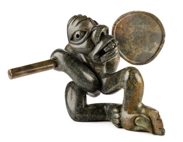 Lot 111 ABRAHAM ANGHIK RUBEN, O.C. (1951-), PAULATUK / SALT SPRING ISLAND, B.C.. Drum Dancing Spirit, 1992 stone, 9 x 12 x 13 in (22.9 x 30.5 x 33 cm) ESTIMATE: $2,500 — $3,500 PRICE REALIZED: $2,640.00