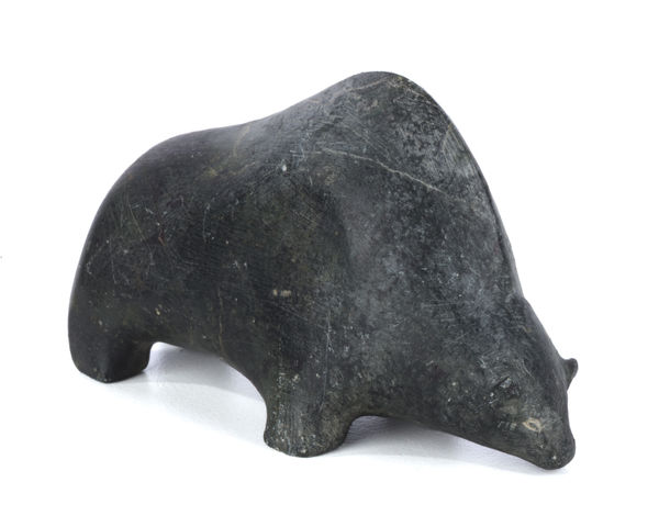 Lot 25 IRENE AMAAK NIUQTUK (1940-) QAMANI'TUAQ (BAKER LAKE) Grazing Muskox, c. 1970 stone, 2 x 3.5 x 1.5 in (5.1 x 8.9 x 3.8 cm) ESTIMATE: $250 — $350 PRICE REALIZED: $390.40