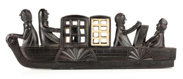 Lot 54 UNIDENTIFIED HAIDA ARTIST Ship Panel Pipe, c. 1840s or 1850s argillite and bone, 4.25 x 12 x 1 in (10.8 x 30.5 x 2.5 cm) ESTIMATE: $20,000 — $30,000 PRICE REALIZED: $19,520.00