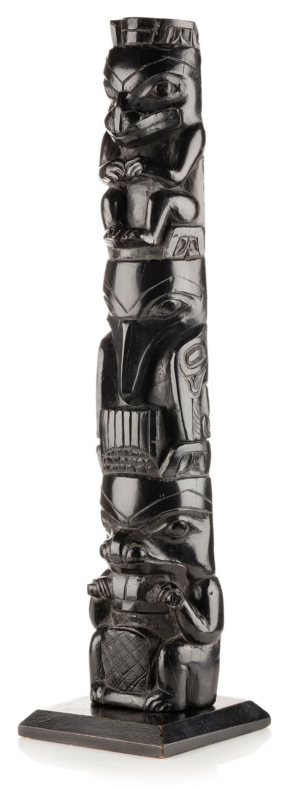 LOT 67 UNIDENTIFIED HAIDA ARTIST Hollow Back Model Totem Pole, c. 1885-90 argillite, 19.75 x 5.5 x 5.25 in (50.2 x 14 x 13.3 cm) ESTIMATE: $7,000 — $10,000 PRICE REALIZED: $10,200.00