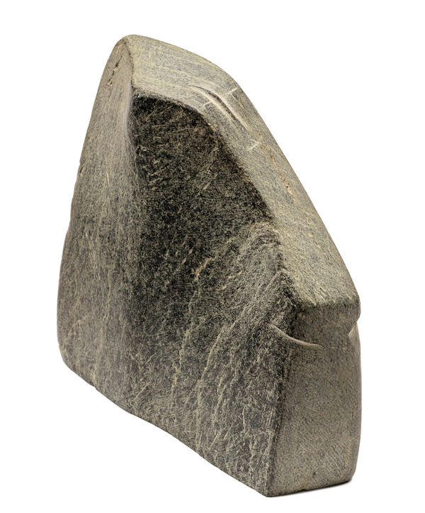 Lot 39 JOHN PANGNARK (1920-1980) ARVIAT (ESKIMO POINT) Figure, early 1970s stone, 4.5 x 4.75 x 1.25 in (11.4 x 12.1 x 3.2 cm) ESTIMATE: $1,500 — $2,500 PRICE REALIZED: $3,120.00