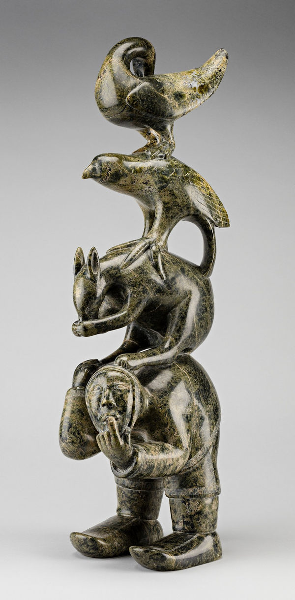 Lot 108 PITSEOLAK NIVIAQSI R.C.A. (1947-2015) KINNGAIT (CAPE DORSET) Totemic Composition with Animals and Hunter, late 1990s stone, 23.5 x 6 x 7.5 in. (59.7 x 15.2 x 19.1 cm) ESTIMATE: $10,000 — $15,000 PRICE REALIZED: $10,800.00