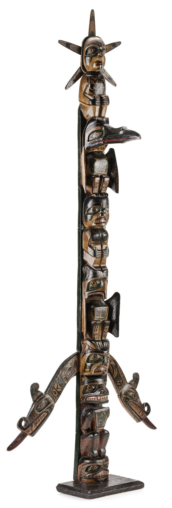 Lot 108 UNIDENTIFIED KWAKWA̱KA̱ʼWAKW ARTIST Model Totem Pole, c. 1890-1910 wood and pigment, 49.25 x 20.5 x 7.75 (125.1 cm x 52.1 x 19.7 cm) ESTIMATE: $5,000 — $8,000 PRICE REALIZED: $14,640.00