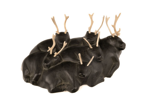Lot 107 MATHEW AQIGAAQ (1940-2010) QAMANI'TUAQ (BAKER LAKE) Heaping Herd of Resting Caribou, c. early 1970s stone and antler, 7.25 x 15.5 x 9.5 in (18.4 x 39.4 x 24.1 cm) ESTIMATE: $4,000 — $6,000 PRICE REALIZED: $12,200.00