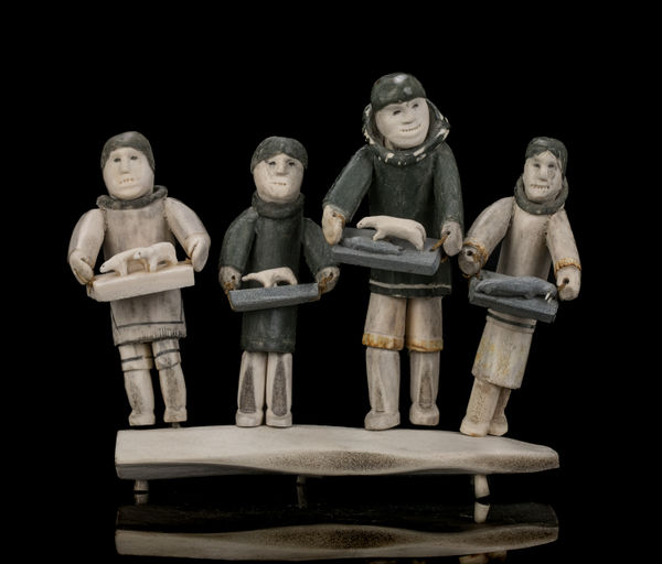ROMEO EEKERKIK (1923-1983) ARVIAT (ESKIMO POINT) Four Inuit Bringing their Works to the Co-Op, 1975 antler, stone, and sinew, 9.25 x 12 x 4 in (23.5 x 30.5 x 10.2 cm)