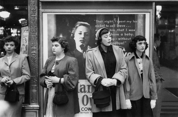 Louis Faurer, New York City, NY, (women in front of billboard), 1949.