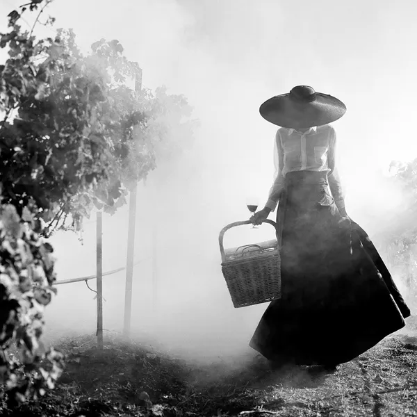 Rodney Smith black and white photography B&W photography Woman Holding up dress in vineyard Sun Valley Art
