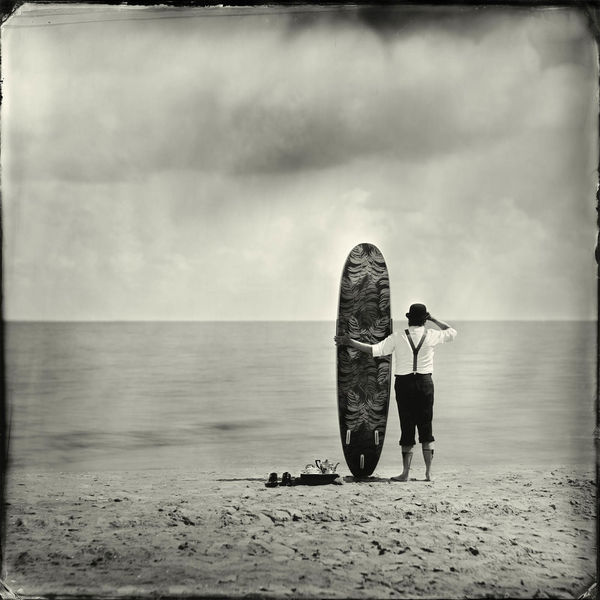 Alex Timmermans photography man with surfboard buy here Gilman Contemporary Sun valley art gallery