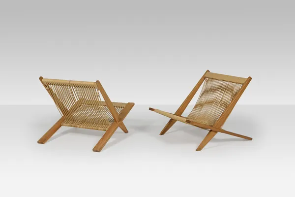 Pair of wooden chairs with flagline