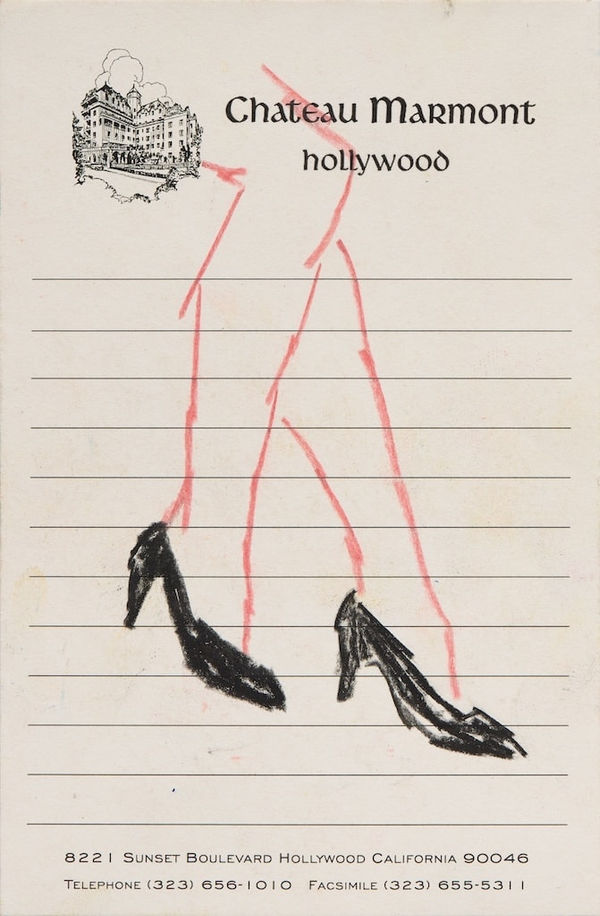 sketch of legs in black high heels on notepad paper