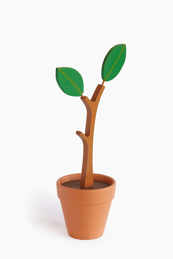 Jeff Canham wooden plant sculpture in a terra cotta pot