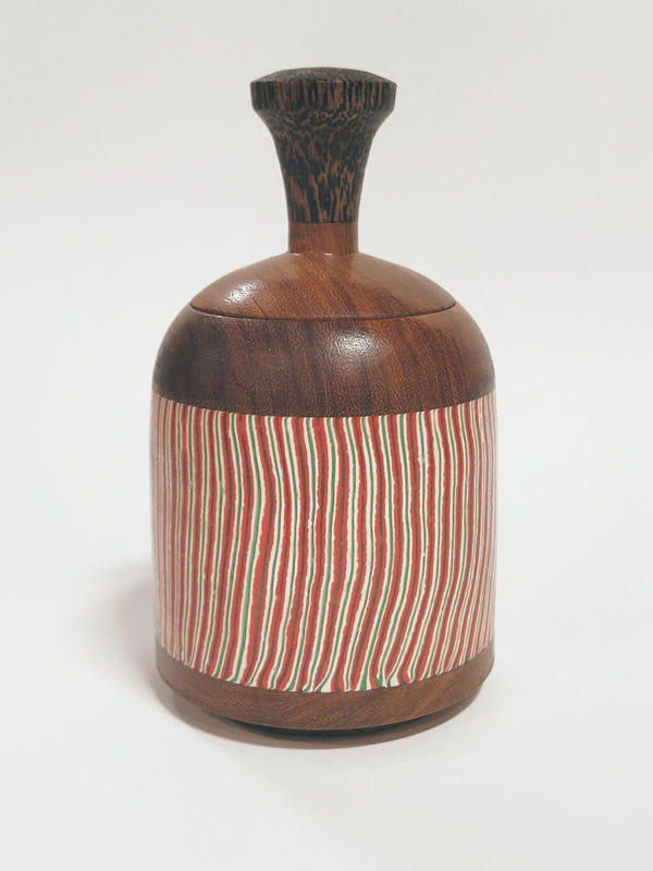 Miles Robinson - wooden vessel with red and white vertical stripes