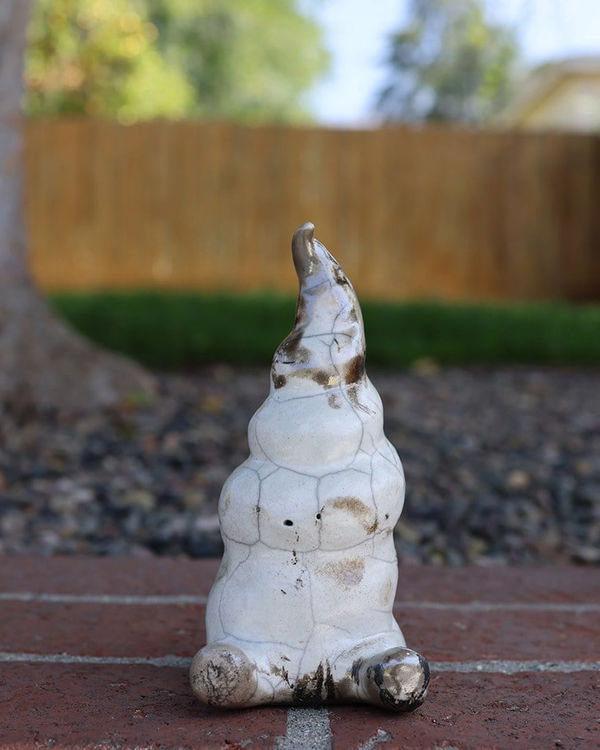 So Youn Lee ceramic white sculpture of swirly mound with feet (aka slushy boy)