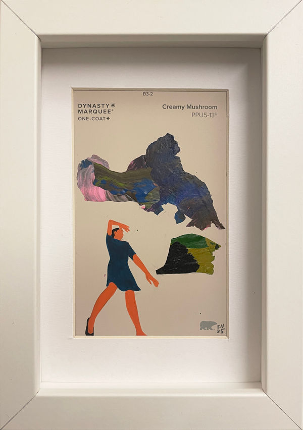 Painting on a cream paint chip of a woman in a dress laying on her back in white frame