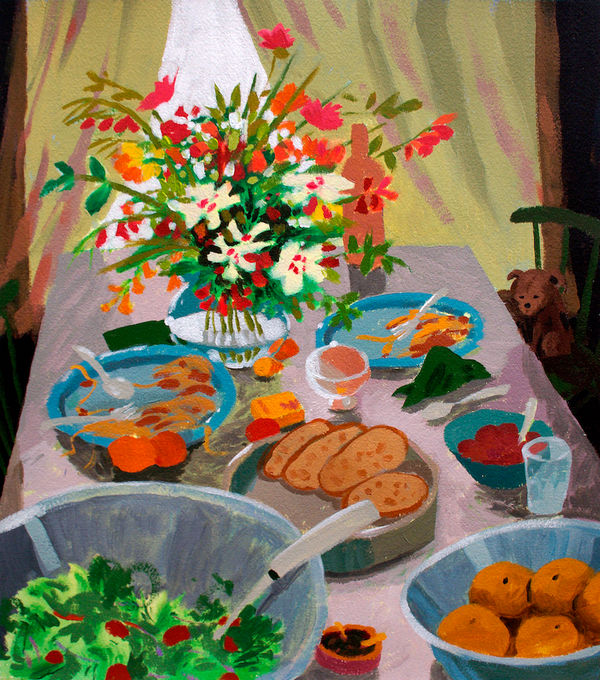 Dining table with an assortment of dishes like salad and bread as well as a large bouquet of flowers