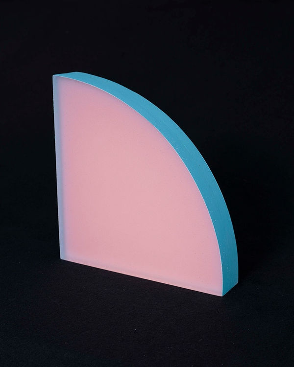 Rachel Strum - epoxy neon sculpture of a quarter round panel - pink and blue.