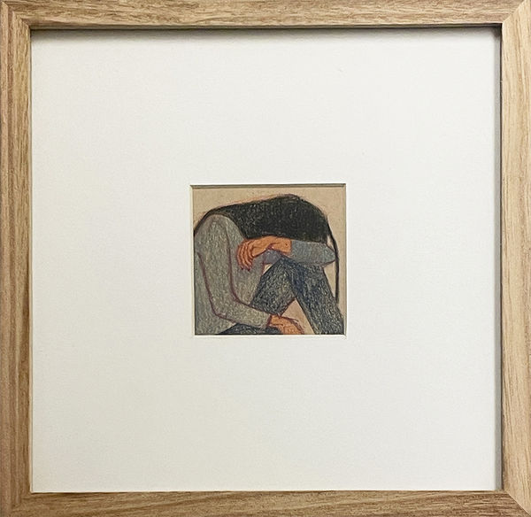 Colored pencil drawing of a seated woman resting her head on her arm in wood frame