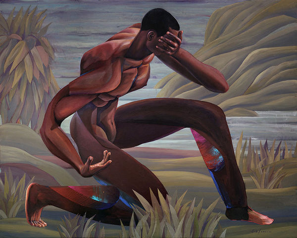 Side profile of a man lunging on the ground outside in nature with one hand covering his face