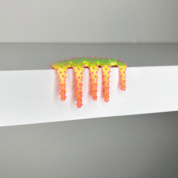 blob sculpture with orange, yellow, and green