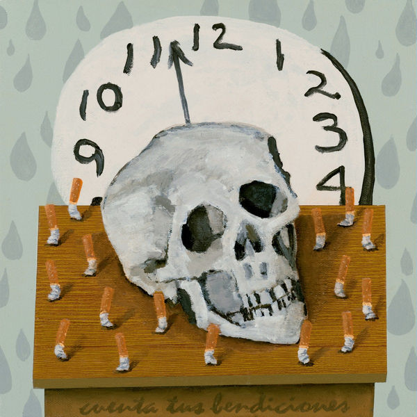 Painting of a human skull on a small wooden table with a bunch of crushed cigarettes surrounding it. In the background is a large circular clock and a light bluish gray background
