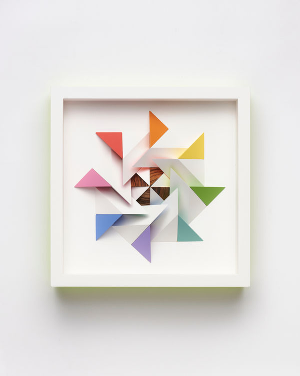 wooden geometric wall sculpture by Sean newport - rainbow