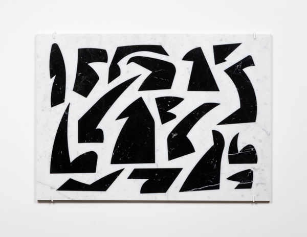 Wall-mounted, white rectangular marble slab inlaid with several black marble shapes resembling abstract bird-like forms with beaks.