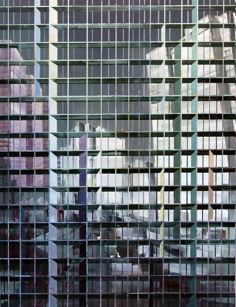 Abstract urban landscape with several white high rise buildings underneath a dark stormy sky A multi-colored grid of alternating thin and thick horizontal and vertical lines form the illusion of foreground scaffolding