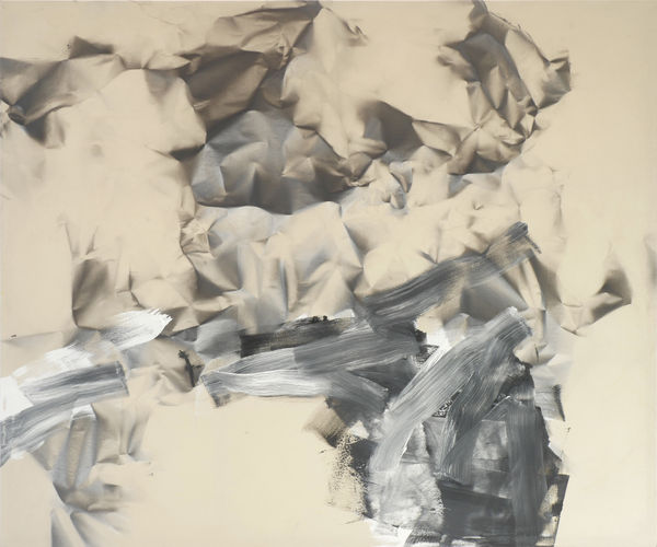 On the lower half of the canvas wide painterly brush strokes containing white and grey colors layer over an abstract smoky graphite-colored form that expands across the canvas and mimics the texture of crumpled paper the canvases unpainted cream color of the canvas is exposed underneath the painted forms.