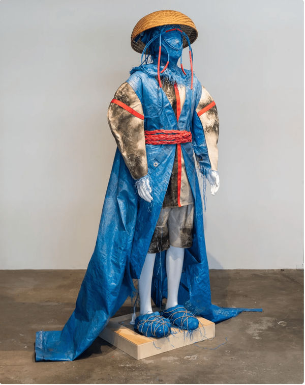 Joshua Sin Descendent, 2022 plastic tarp, rope, basket, wire, mannequin 85 x 30 x 12 in 215.9 x 76.2 x 30.5 cm