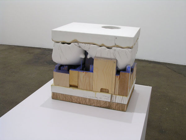 Shorter stacked mixed media blocks which fit together showing their textured sides Each layer can be removed and stand alone to reveal the intricacies of their surfaces