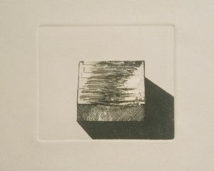 Dark etching printed onto a white piece of paper depicting a wooden rectangular black that casts a dramatic shadow to its lower right