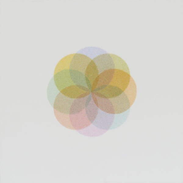 Against a white background, several circles made of tiny dots of a single pastel color that overlap to form a flower-like pattern in colors created from the layering.