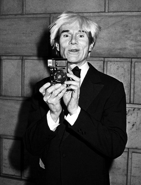 Ron Galella, Andy Warhol attends Council of Fashion Designer of America Awards Dinner, 1985