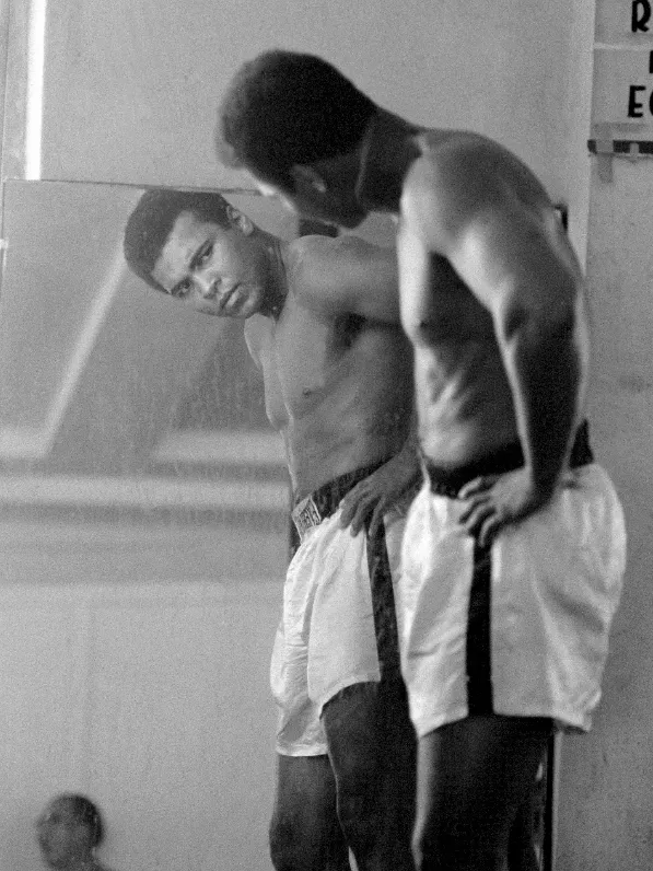 Neil Leifer, Ali at Training Camp - Ali Looking in Mirror, 1970