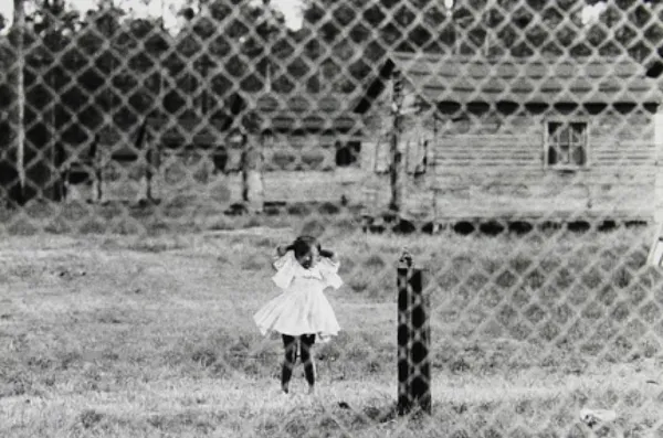 Bruce Davidson, Untitled, Time of Change (Girl Behind Chain Link Fence), 1962
