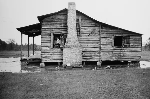 Bruce Davidson, Untitled, Time of Change (View of Mrs. Blackman and Baby at Window), 1962