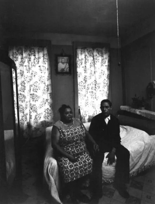 Bruce Davidson, Untitled, East 100th Street (Elderly Couple on Bed with Christ on Wall), 1966 - 68