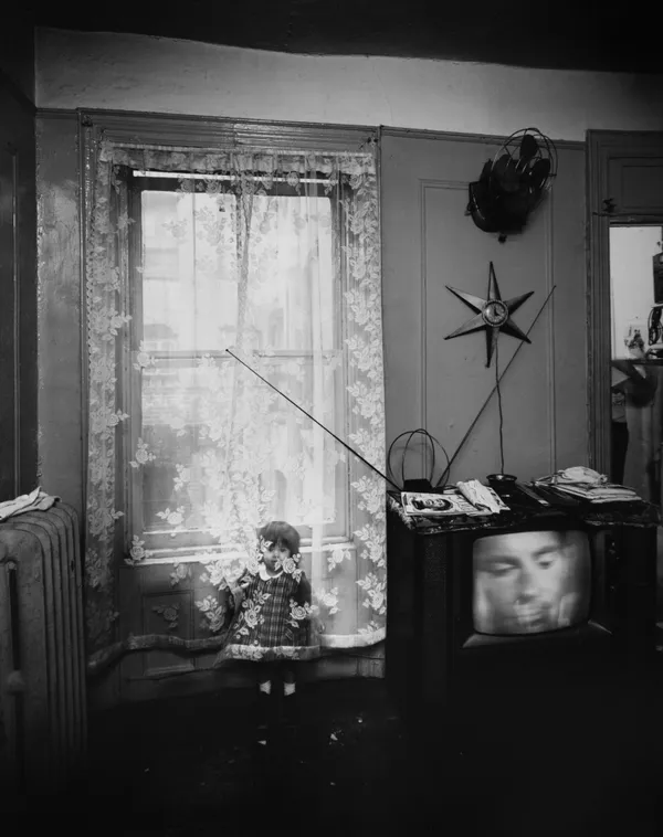 Bruce Davidson, Untitled, East 100th Street (Child Behind Curtain Next to TV), 1966-68