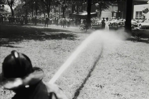Bruce Davidson, Untitled, Time of Change (Fireman Aims Hose, Birmingham, Alabama), 1963