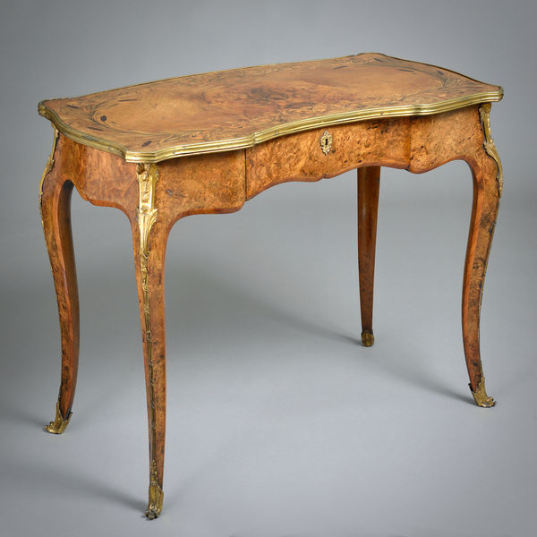 EARLY VICTORIAN ORMOLU-MOUNTED BURR-WALNUT AND MARQUETRY WRITING-TABLE