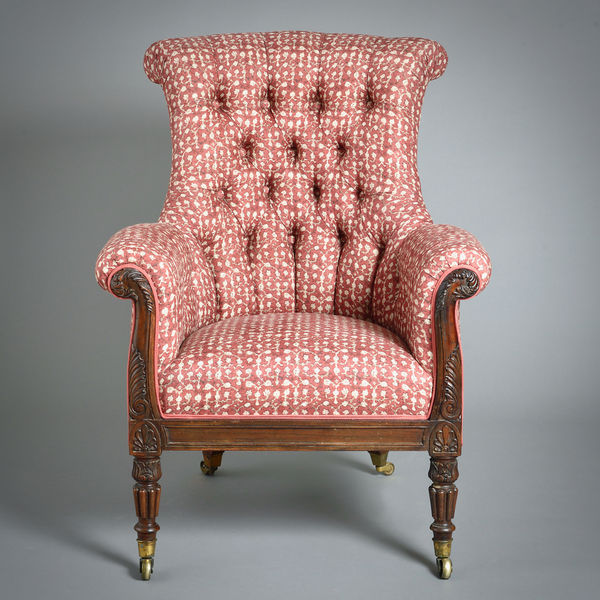 REGENCY CARVED ROSEWOOD LIBRARY ARMCHAIR ATTRIBUTED TO GILLOWS