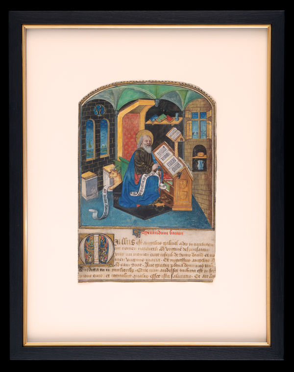 a charming illuminated miniature painting from a luxurious Book of Hours, depicting Saint Luc at his desk