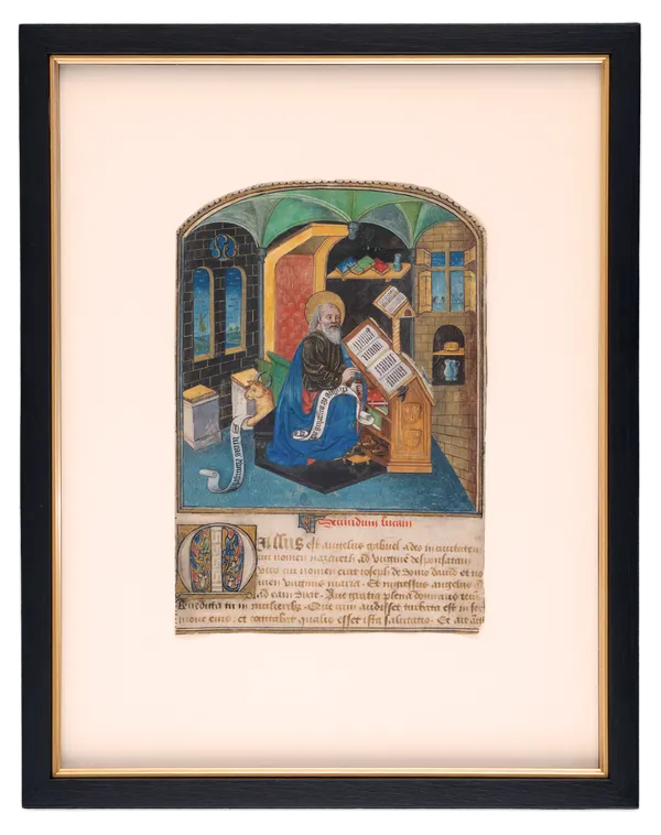a charming illuminated miniature painting from a luxurious Book of Hours, depicting Saint Luc at his desk