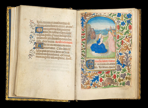 A Book of Hours (use of Rome) produced in Bruges c. 1460 and illuminated by the Mildmay Master. The image shows the illuminated manuscript open on the page of the Virgin and Child miniature painting.