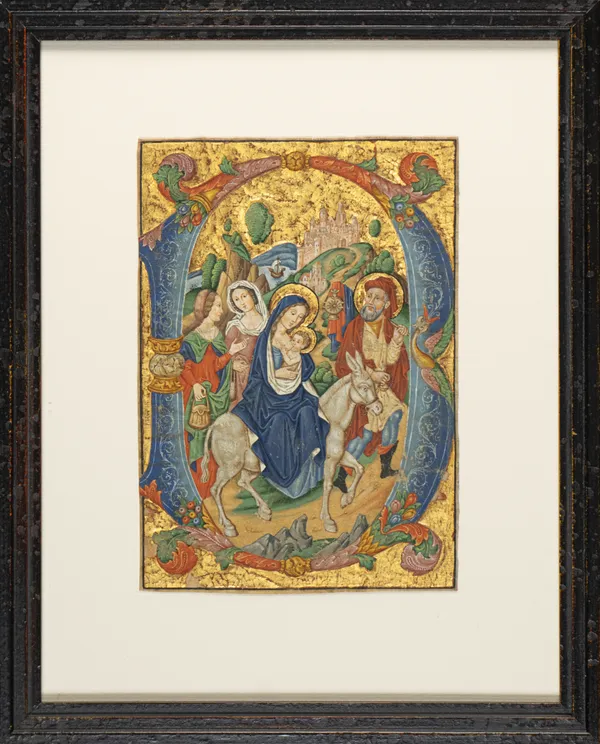 Framed 20th-century medieval-style manuscript illumination by the Spanish Forger depicting the Flight into Egypt, featuring the Holy Family and a donkey within a gold-leaf decorative initial.